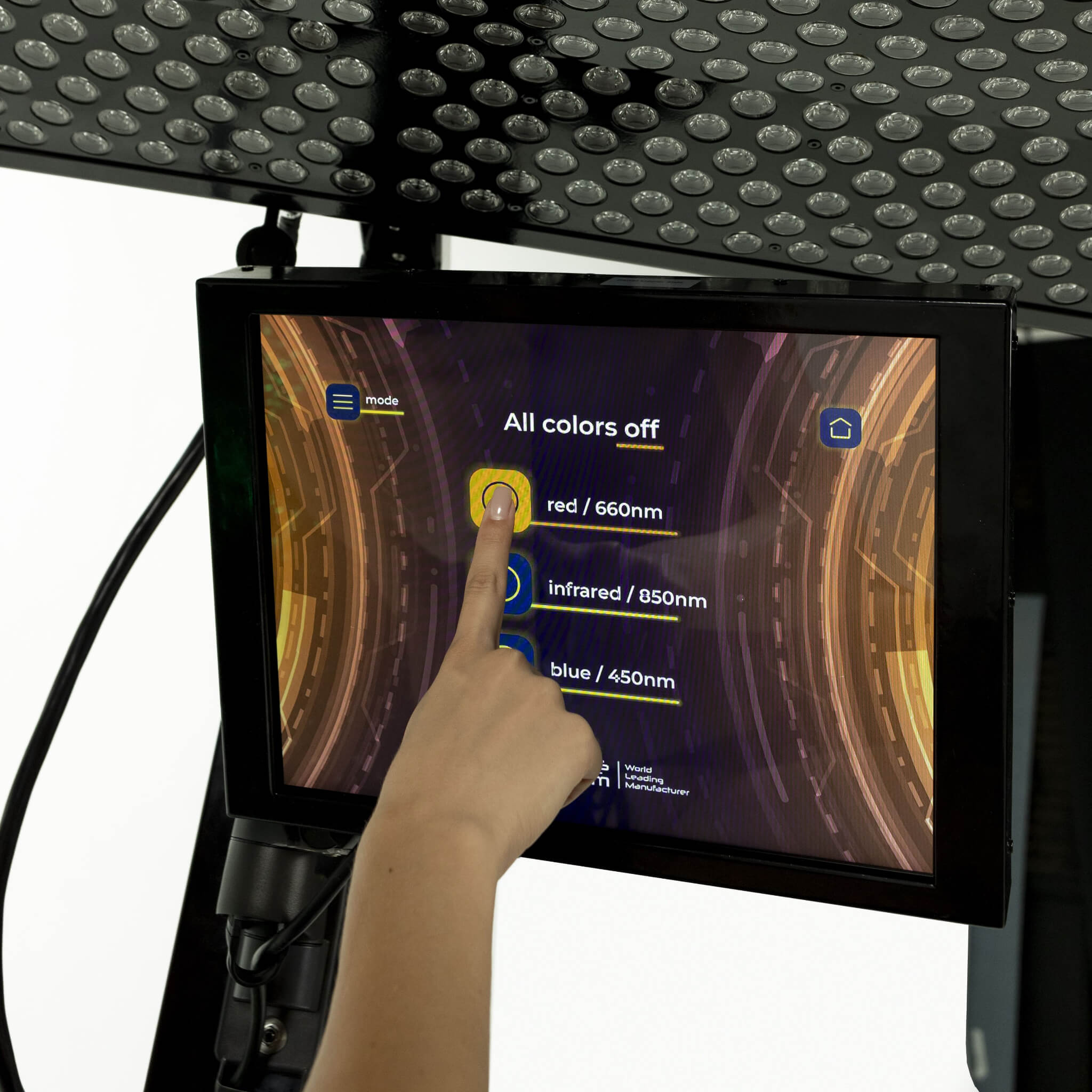 Cryonick InfraCouch Red Light Therapy Bed, hand interacting with a touch screen display