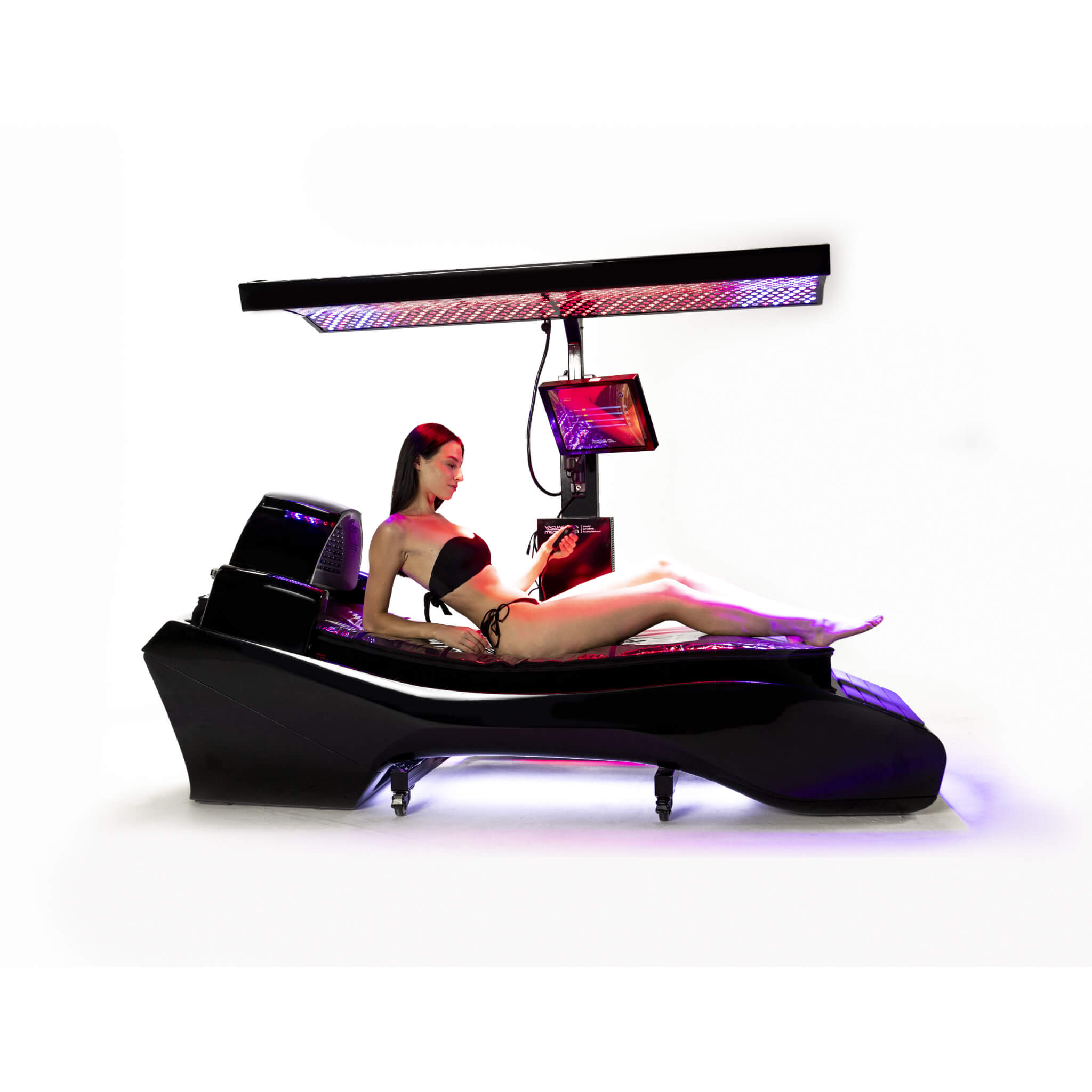 Cryonick InfraCouch Red Light Therapy Bed with top panel lighting and a person lying on it.