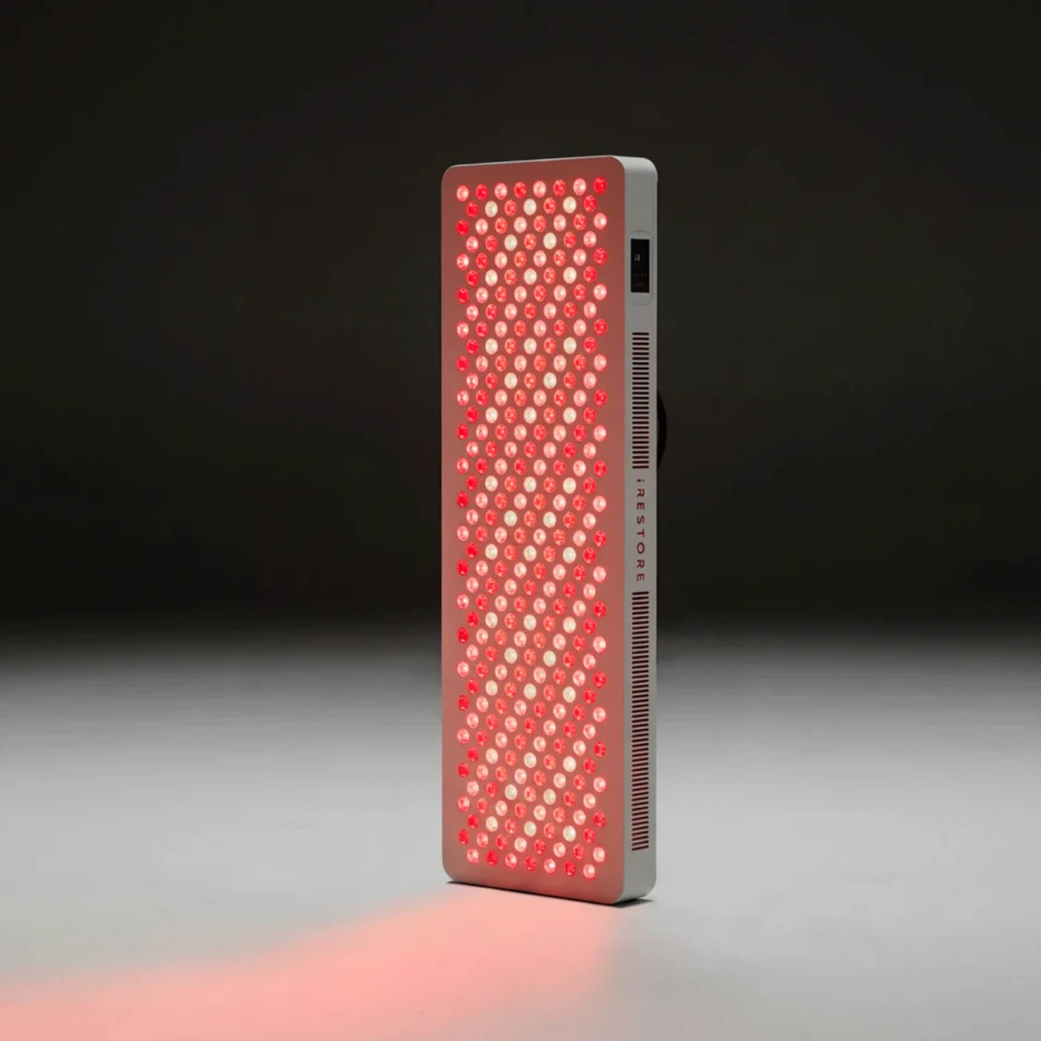 iRESTORE Apex Pro 1500 full body LED panel illuminated in red light