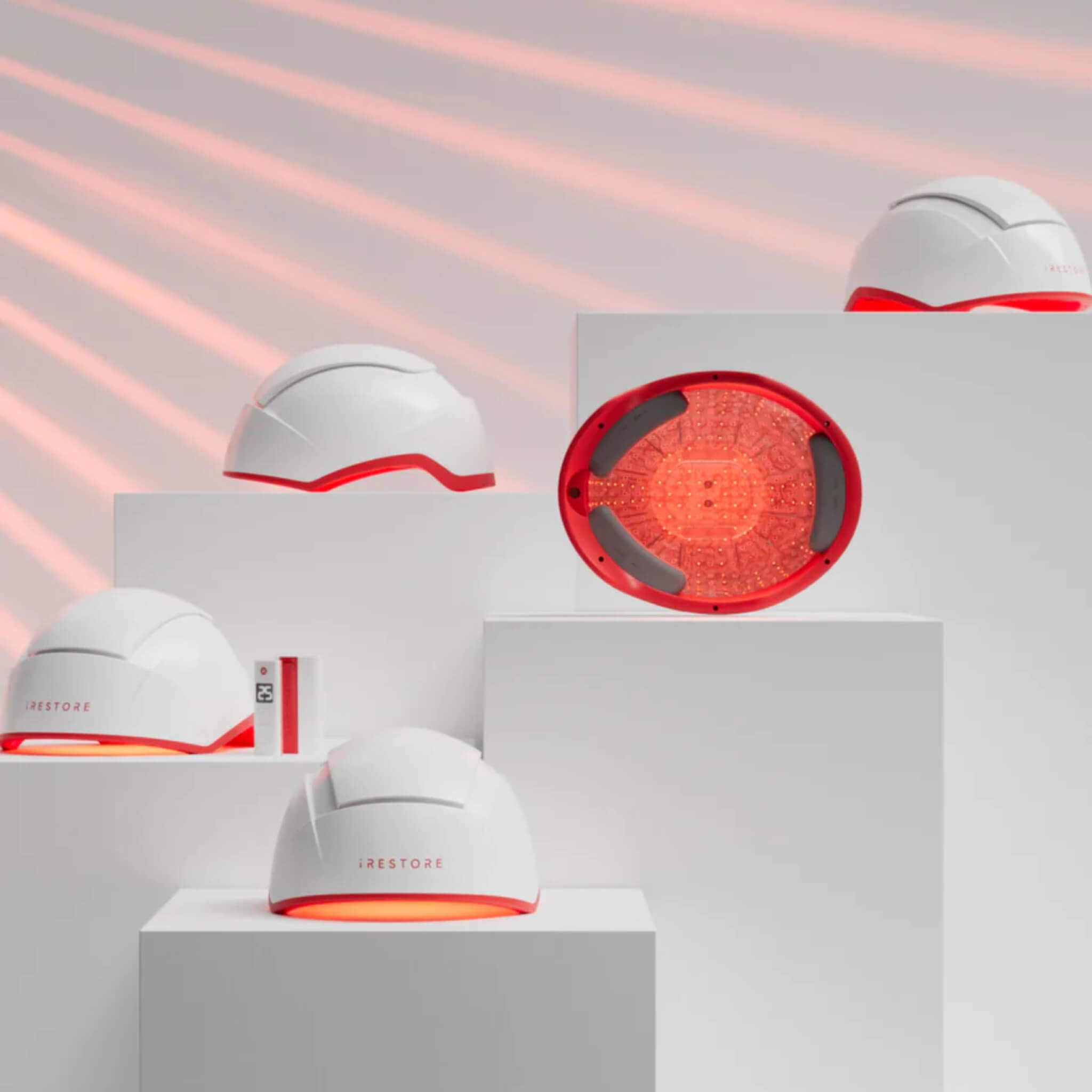 iRESTORE Professional laser and LED diode panel close-up showing red light therapy in use