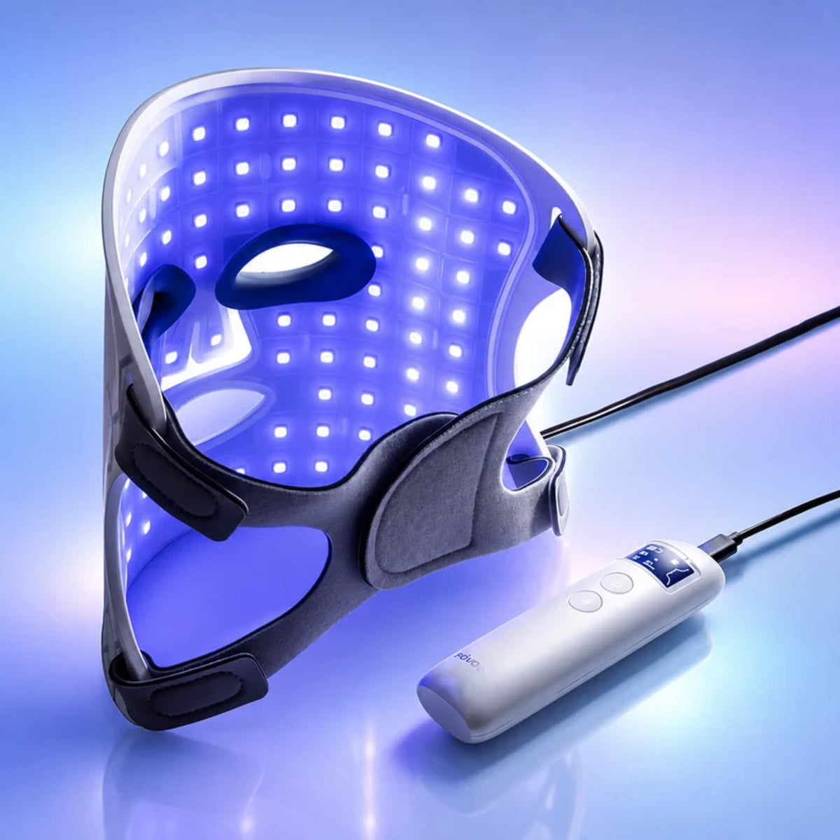 NovaaLab Novaa Glow Therapy Mask in blue light mode with the handheld controller