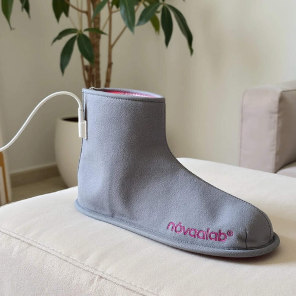 Side view of the NovaaLab Novaa Light Boot with power cord attached