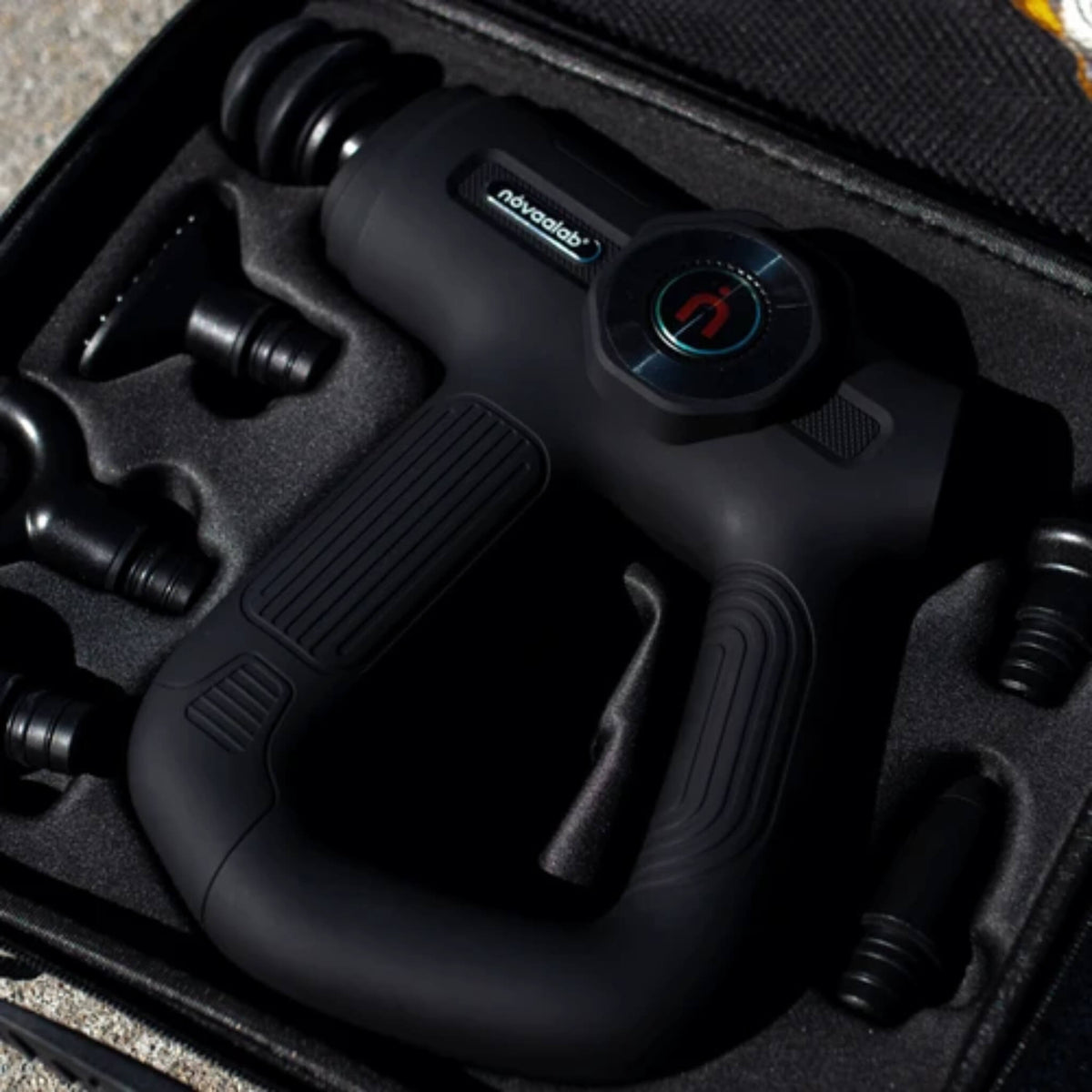 NovaaLab Novaa Pulse R percussion massage gun in its case with the massage heads