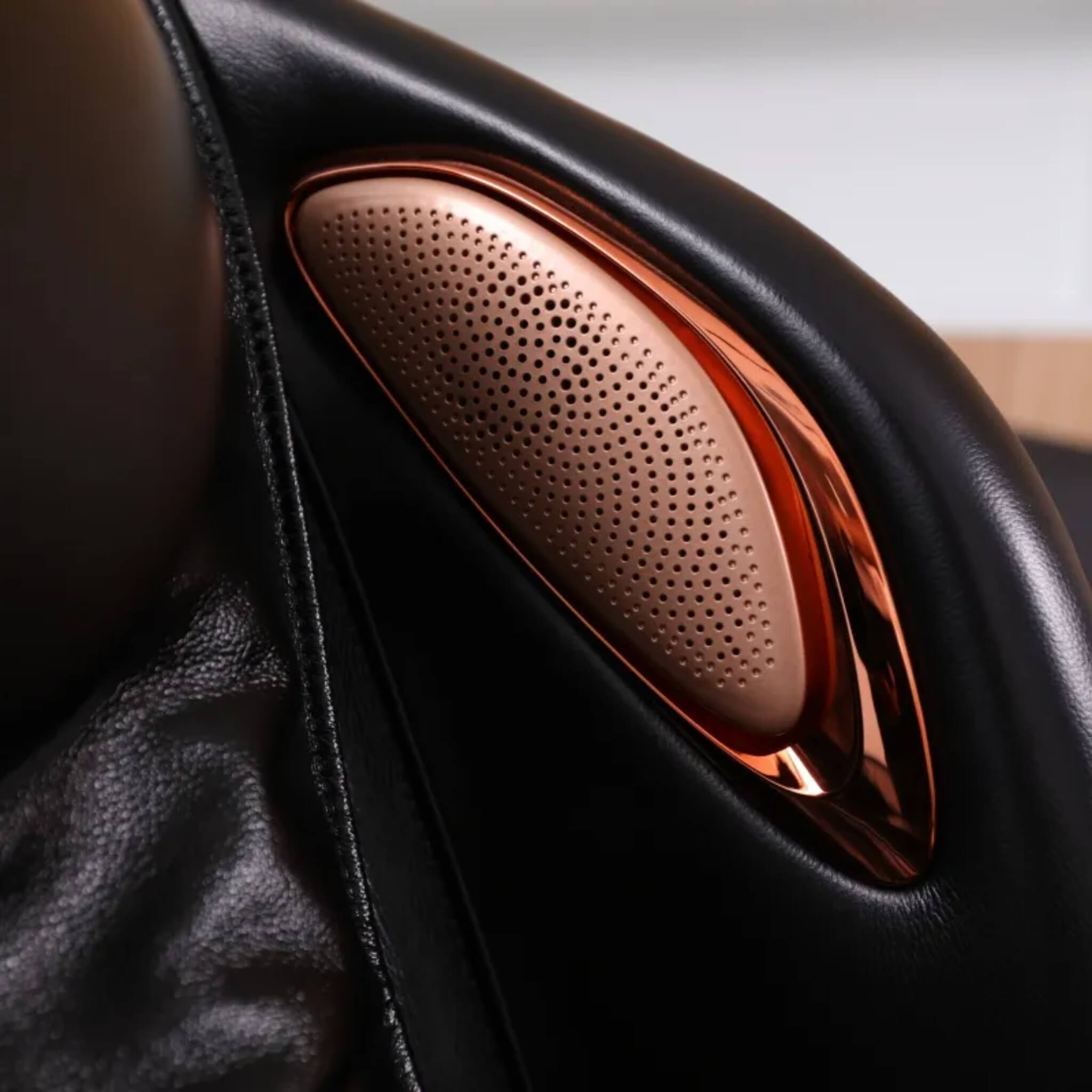 Close-up of the built-in Bluetooth speaker on the DR.BOSS FJ-2025 in black leather