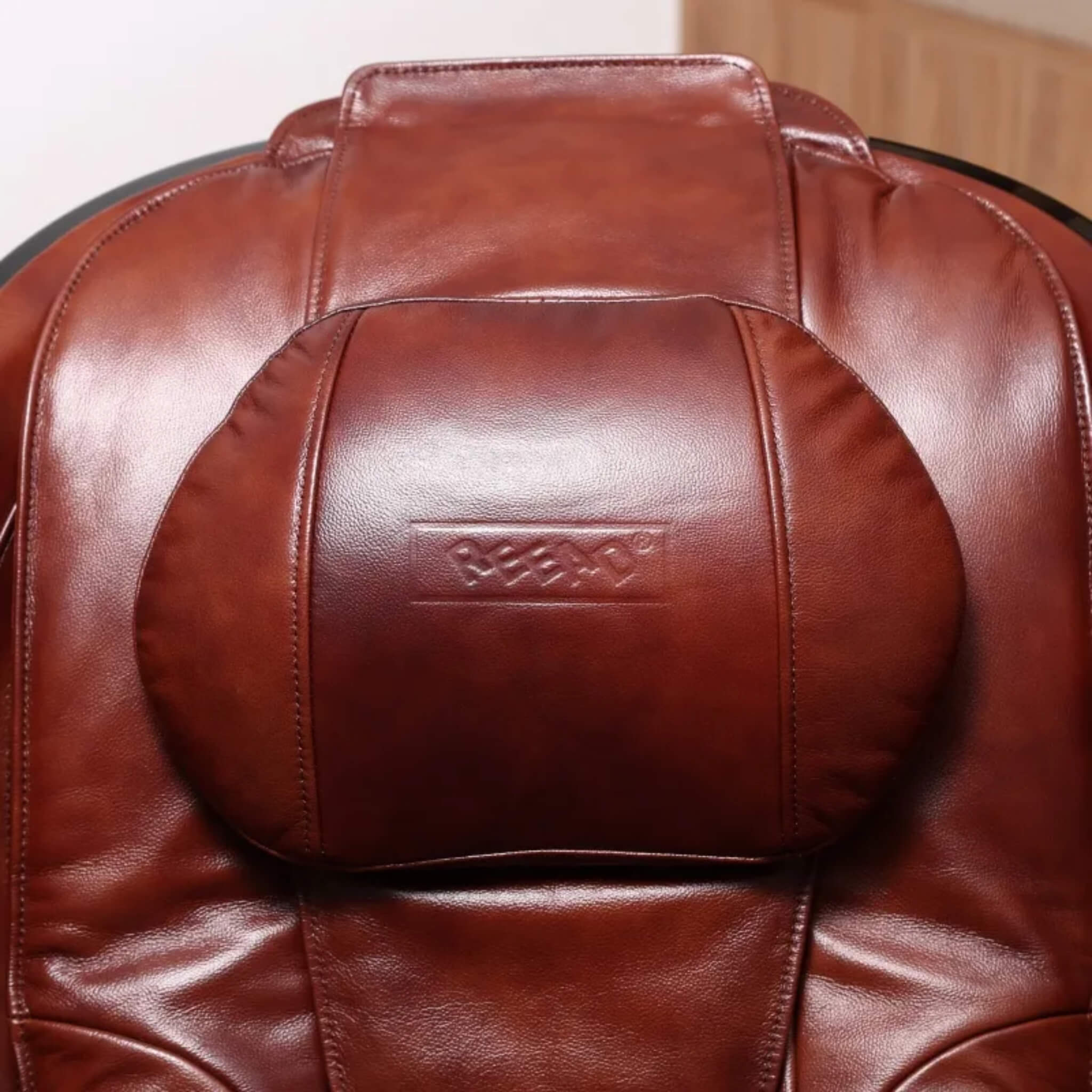 Close-up of the DR.BOSS FJ-2025 headrest in burgundy leather