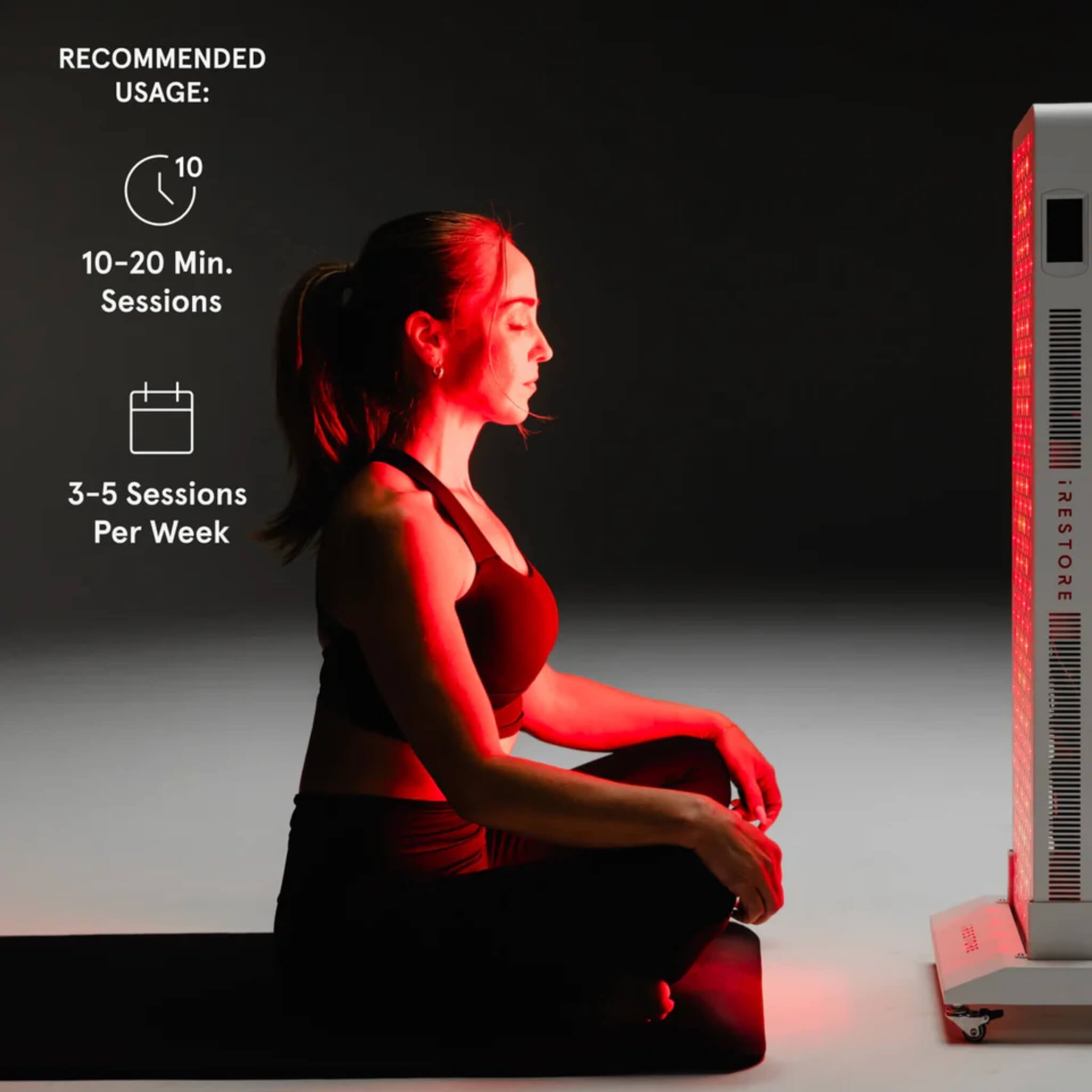 Woman using the iRESTORE Apex Pro 1500 panel, recommended usage 10 to 20 minute sessions, 3 to 5 times per week