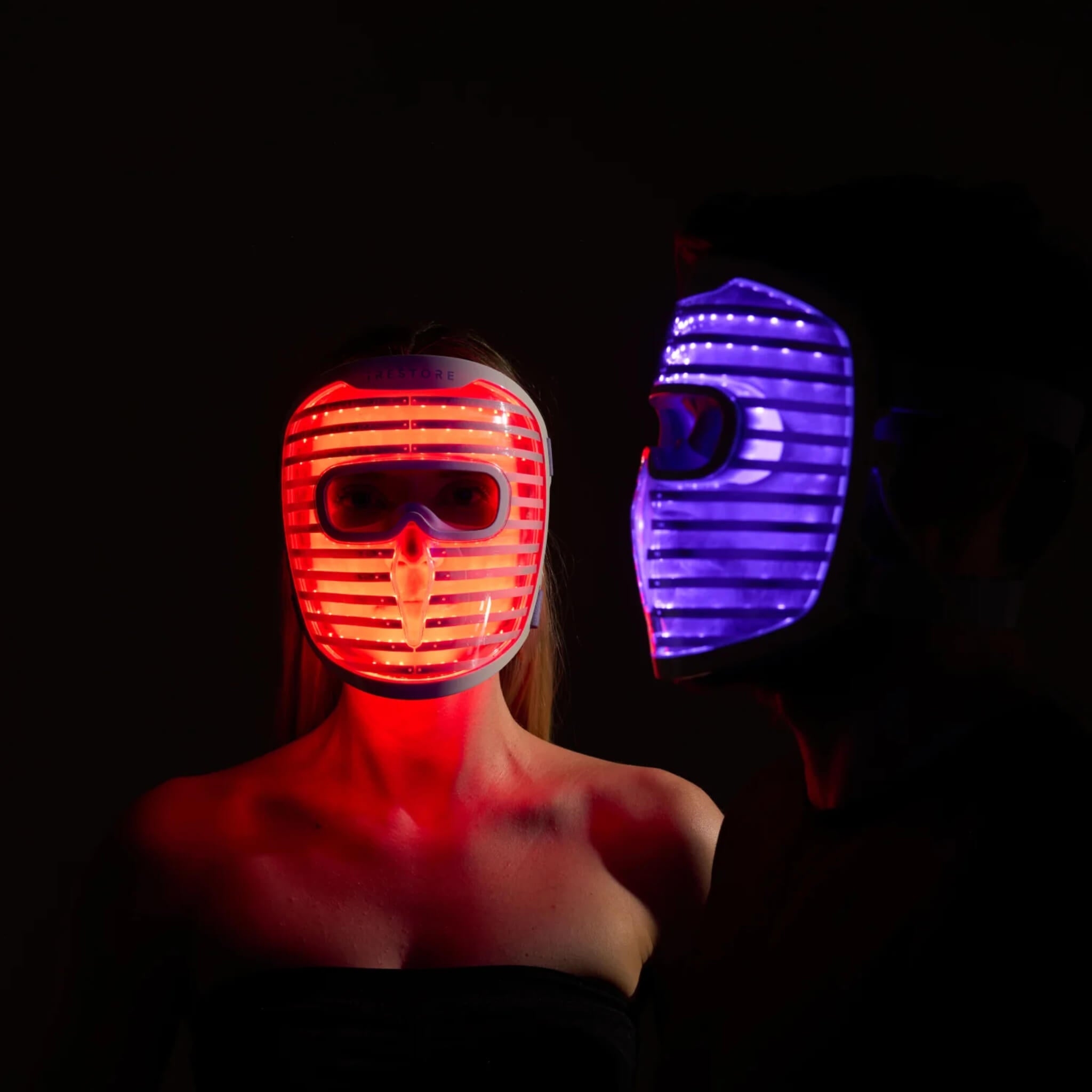 iRESTORE Illumina face mask shown in red light mode and infrared light mode side by side