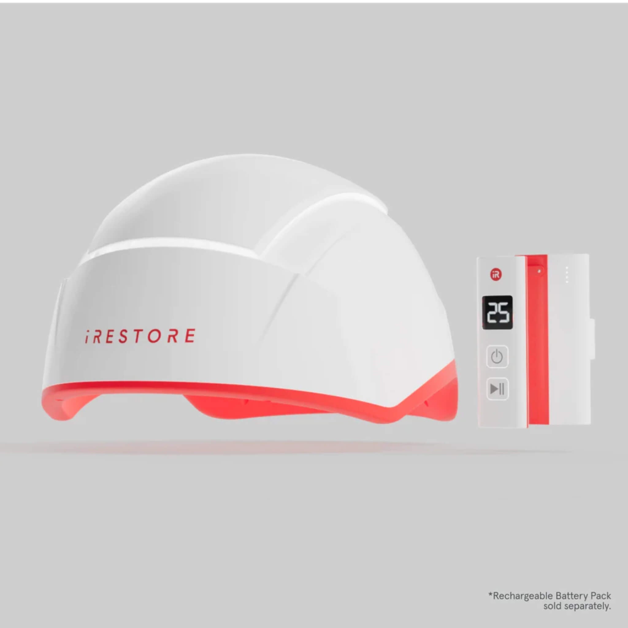 iRESTORE Professional laser hair growth cap with controller and battery pack, side view