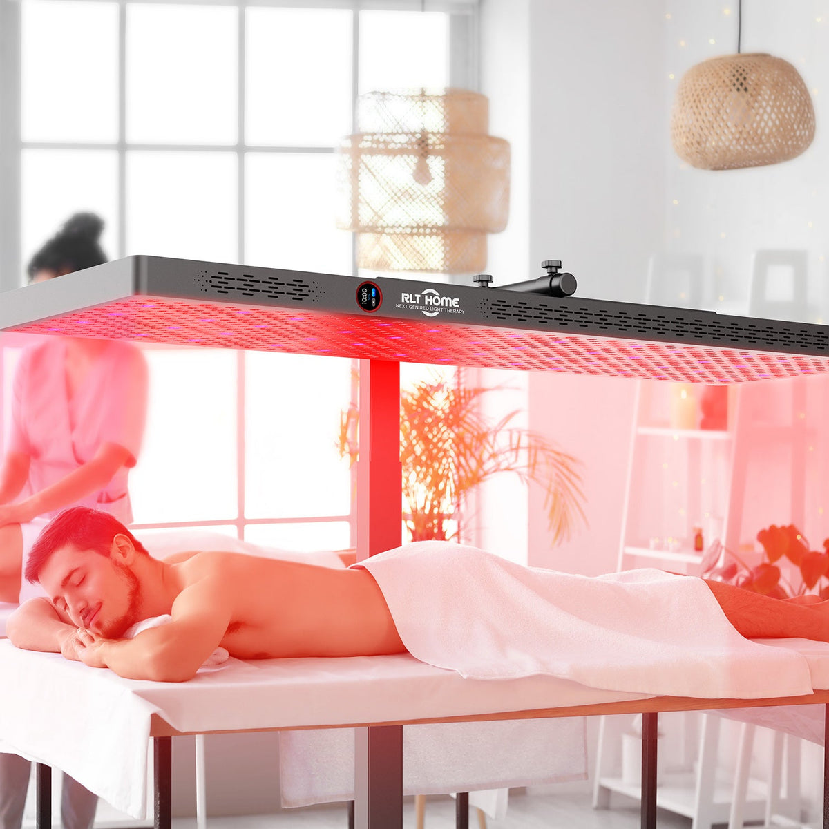 Woman lying on a bed under the RLT Home Total Spectrum ELITE Red Light Therapy Device set horizontal